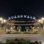 The Boardwalk at Towne Lake illuminated at night, a local landmark in Cypress, Texas