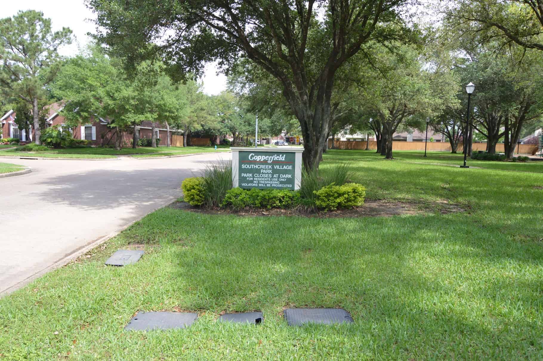 Copperfield Houston TX Southcreek Village Park Sign Royal Gardens and Autumn Laurel 1