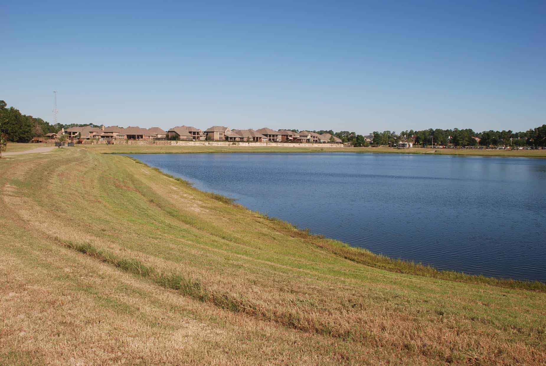 Cypress Park View of Pond & Neighboring Parc Lake Subdivision in Cypress TX