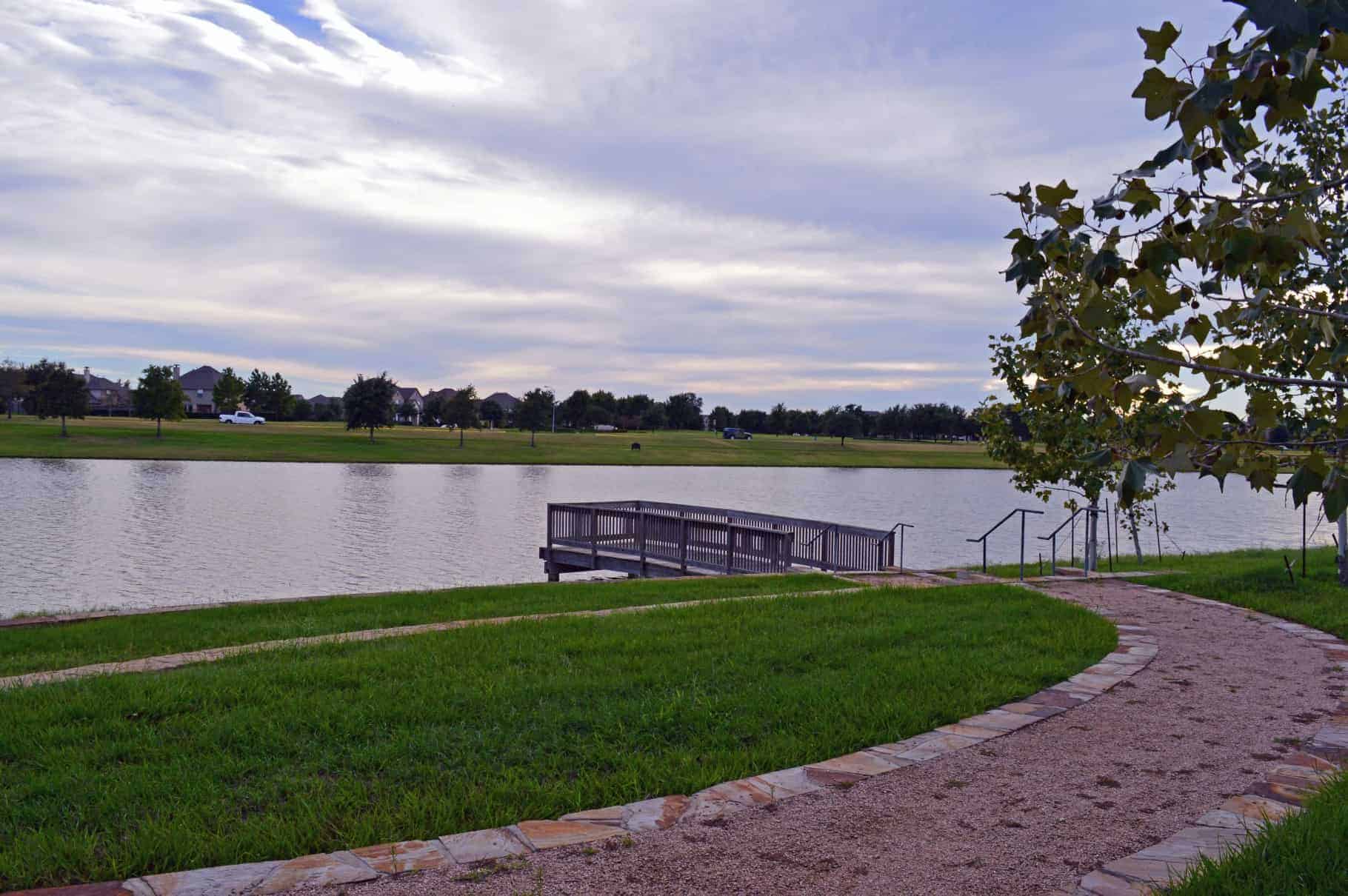 Fishing pier on a stocked lake in Bridgeland, Cypress TX