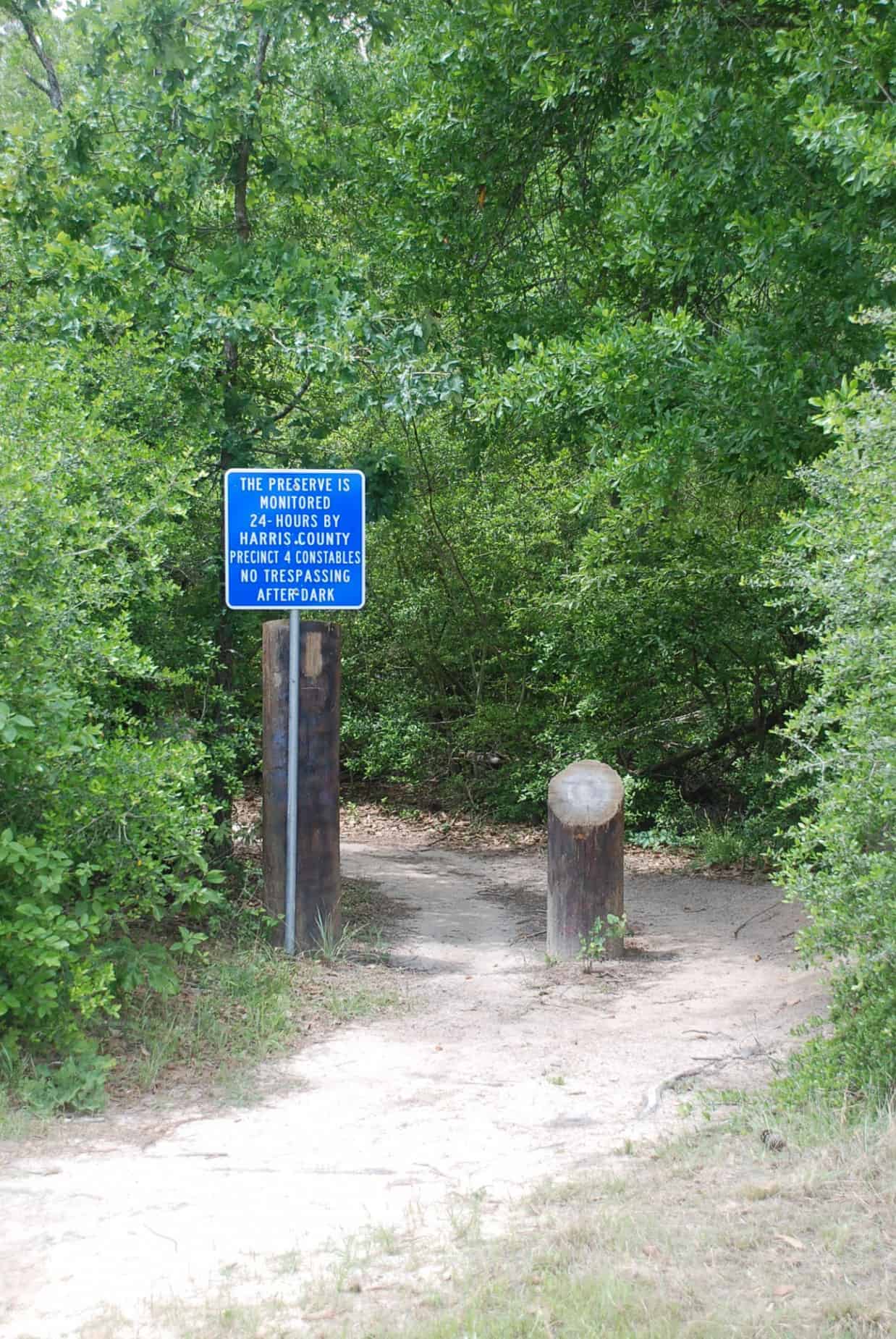 Entrance to one of numerous dirt hiking trails in 100 Acre Wood Preserve Houston TX