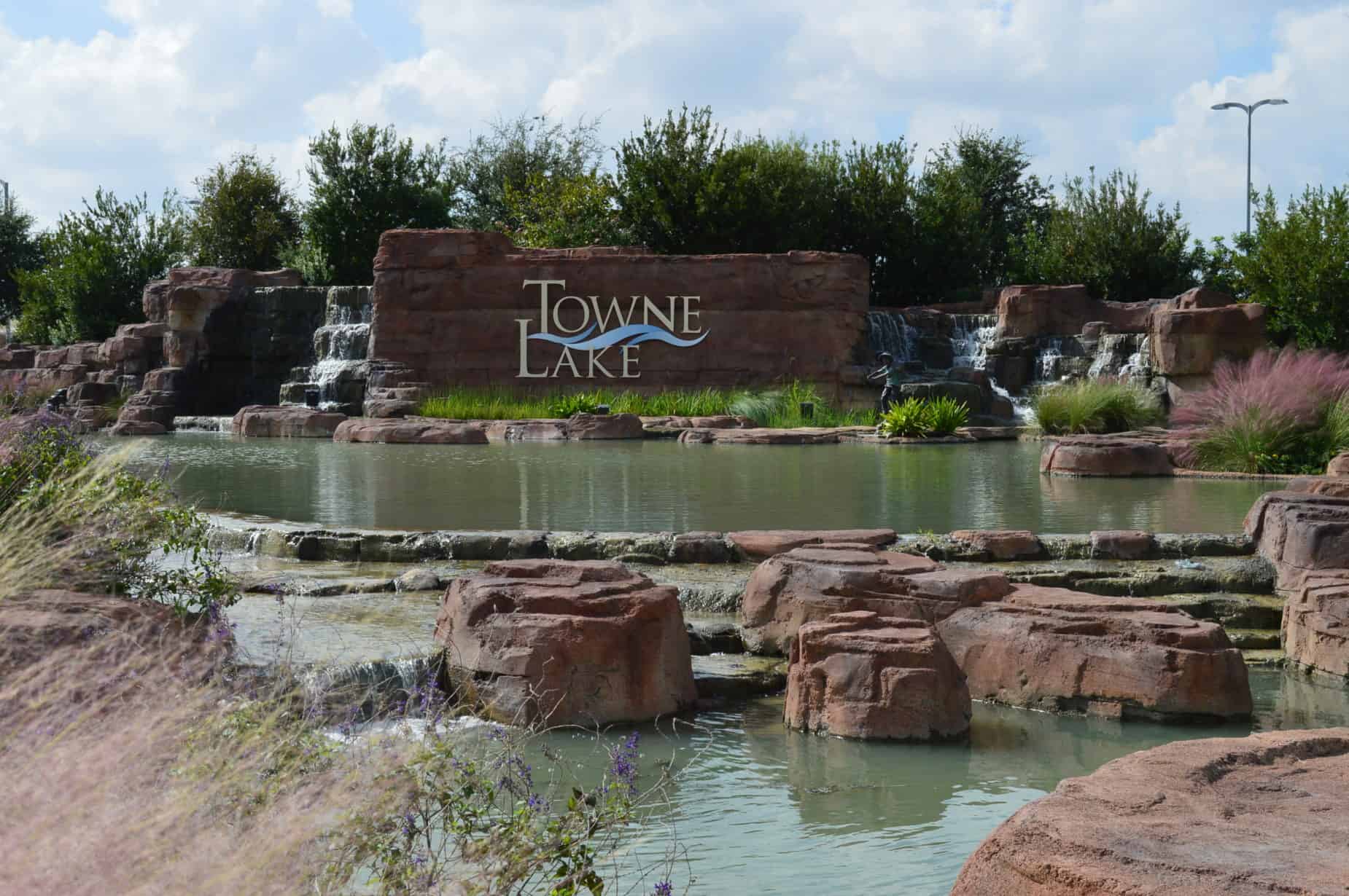 Towne Lake stone entrance monument with waterfalls and landscaping at Barker Cypress and Tuckerton in Cypress, TX 77433