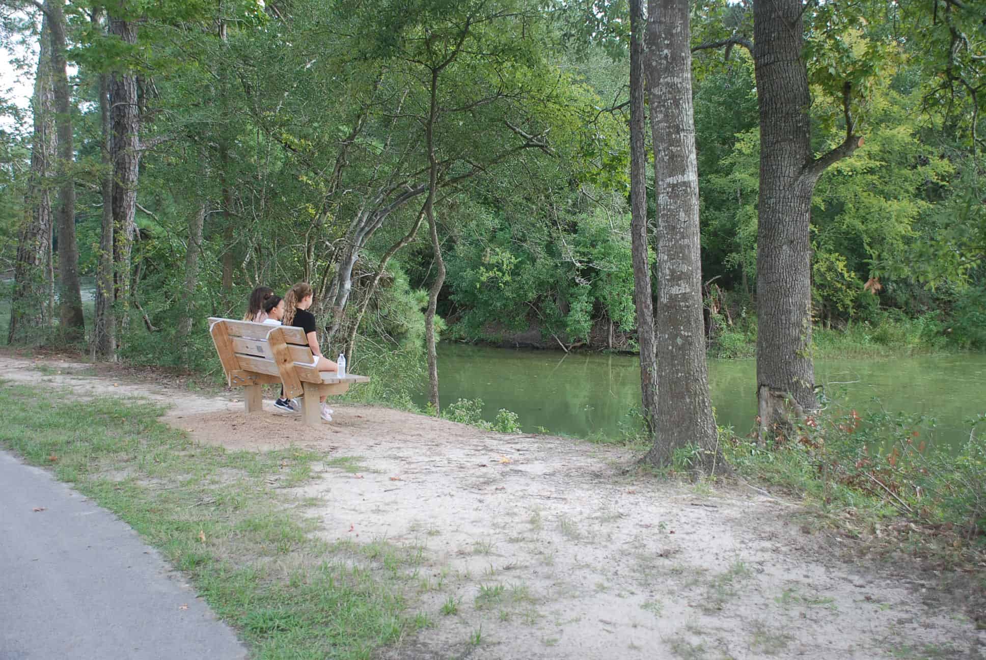 One of several benches along trail surrounding lake