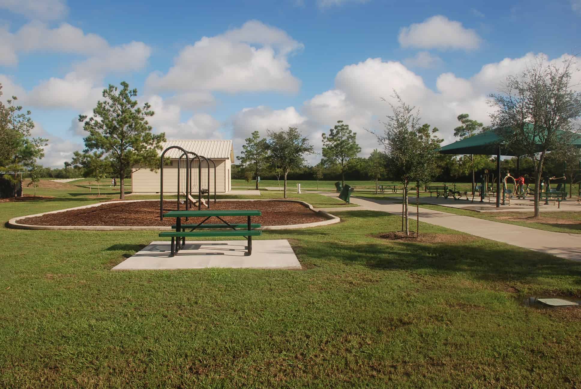 Swingset and Picnic Area adjacent to Fitness Area