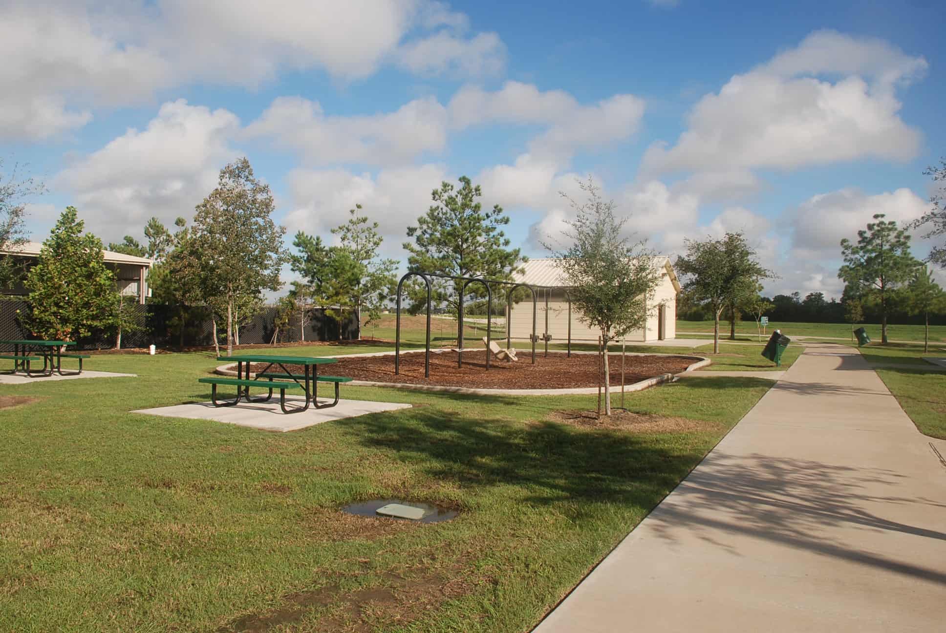 Swingset and Picnic Area adjacent to Fitness Area