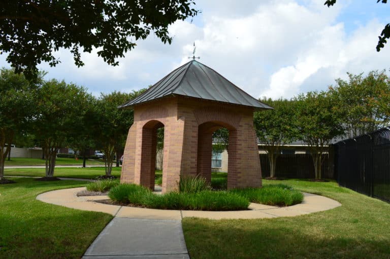 Brick gazebo on the neighborhood green in Sheffield, Houston TX 77095