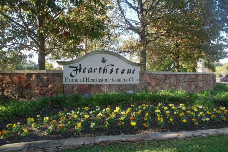 Hearthstone entry sign off FM 529 reading Home of Hearthstone Country Club, Houston TX 77095