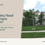 Why do you need homeowners insurance — a fire-damaged Houston home behind a construction fence