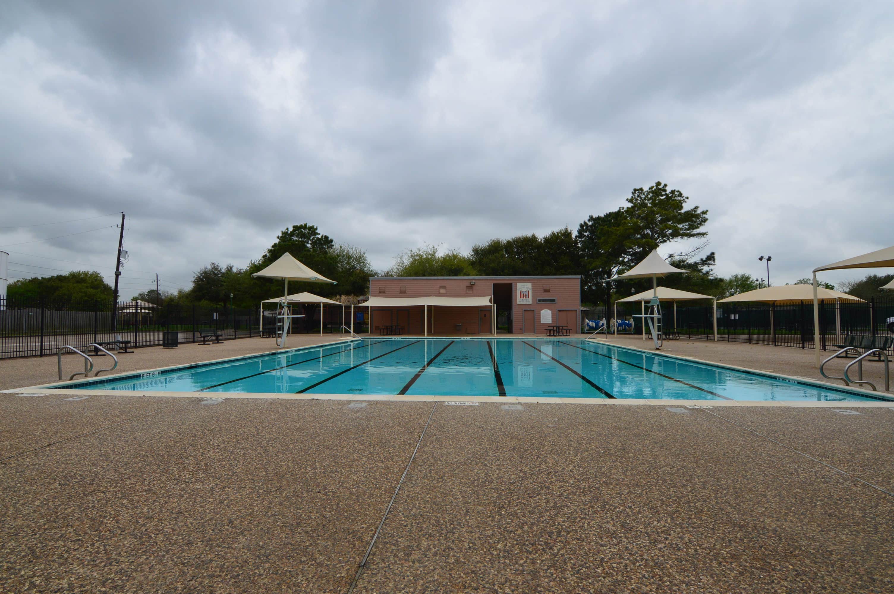 Concord Bridge community pool with lap lanes and shade sails, Houston TX 77041