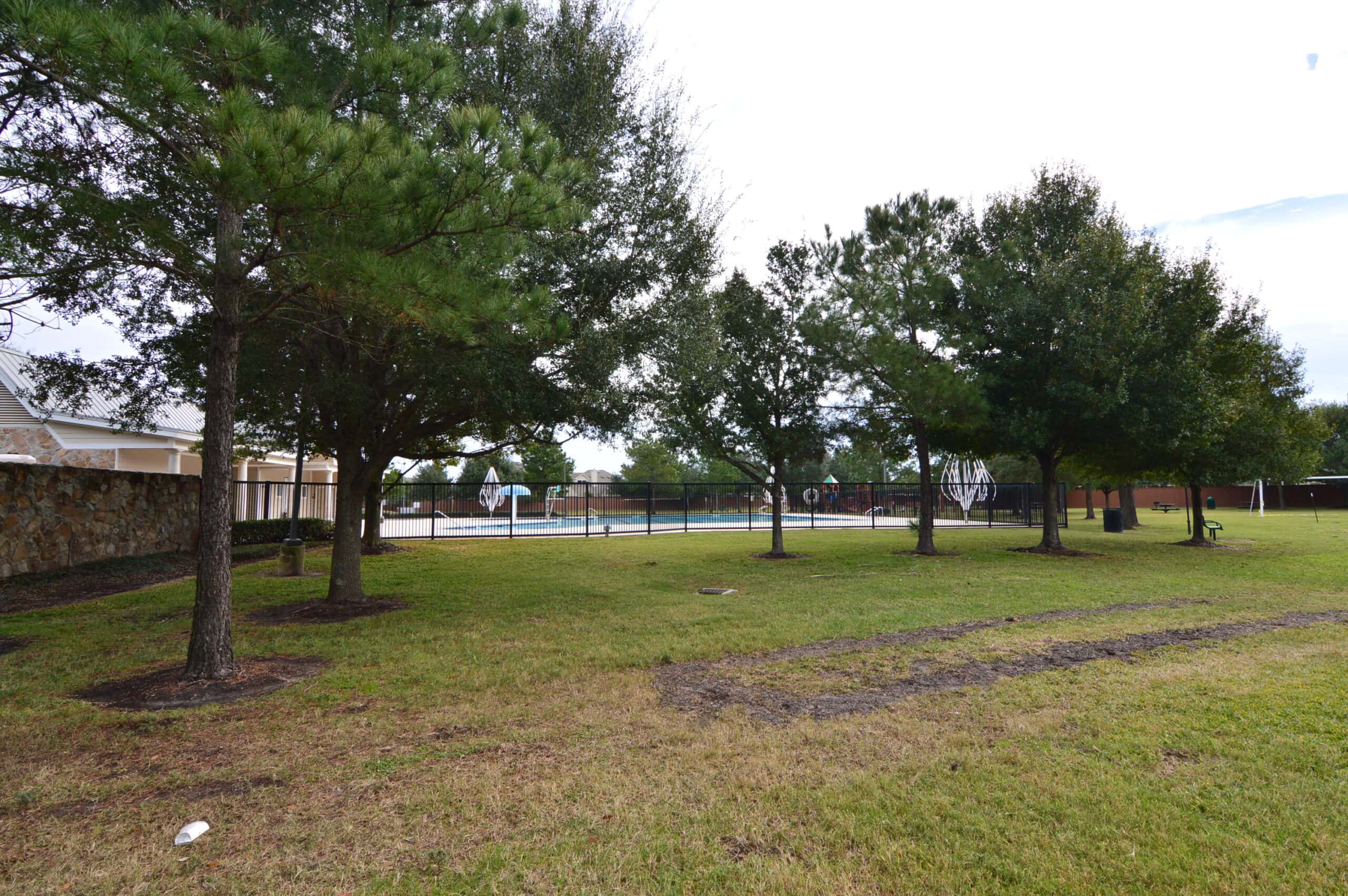 Westgate community pool seen from the neighborhood park in Cypress, TX