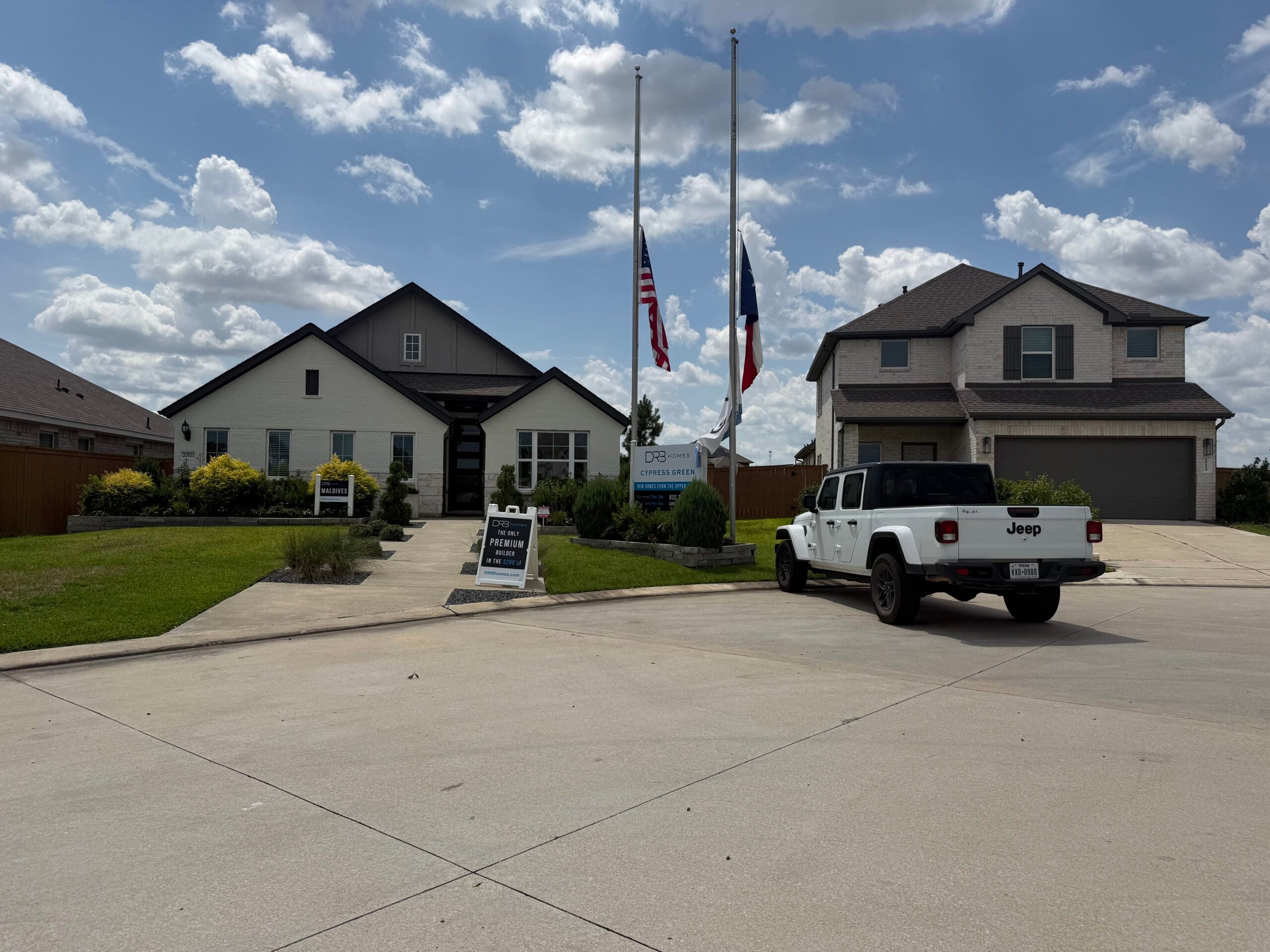 Row of new-construction model homes in Cypress Green, Hockley, TX