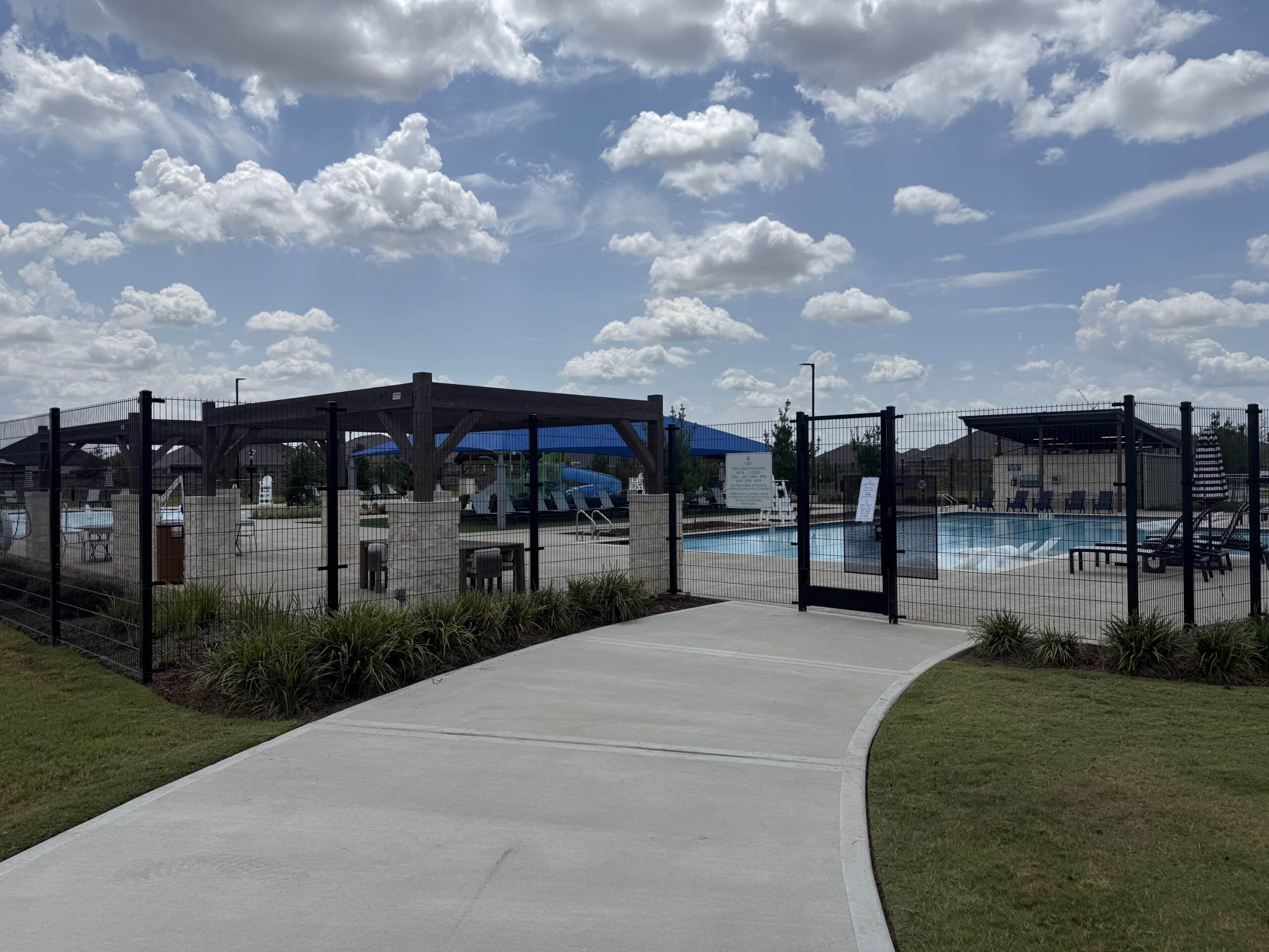 Resort-style pool at the Cypress Green Amenity Village in Hockley, TX