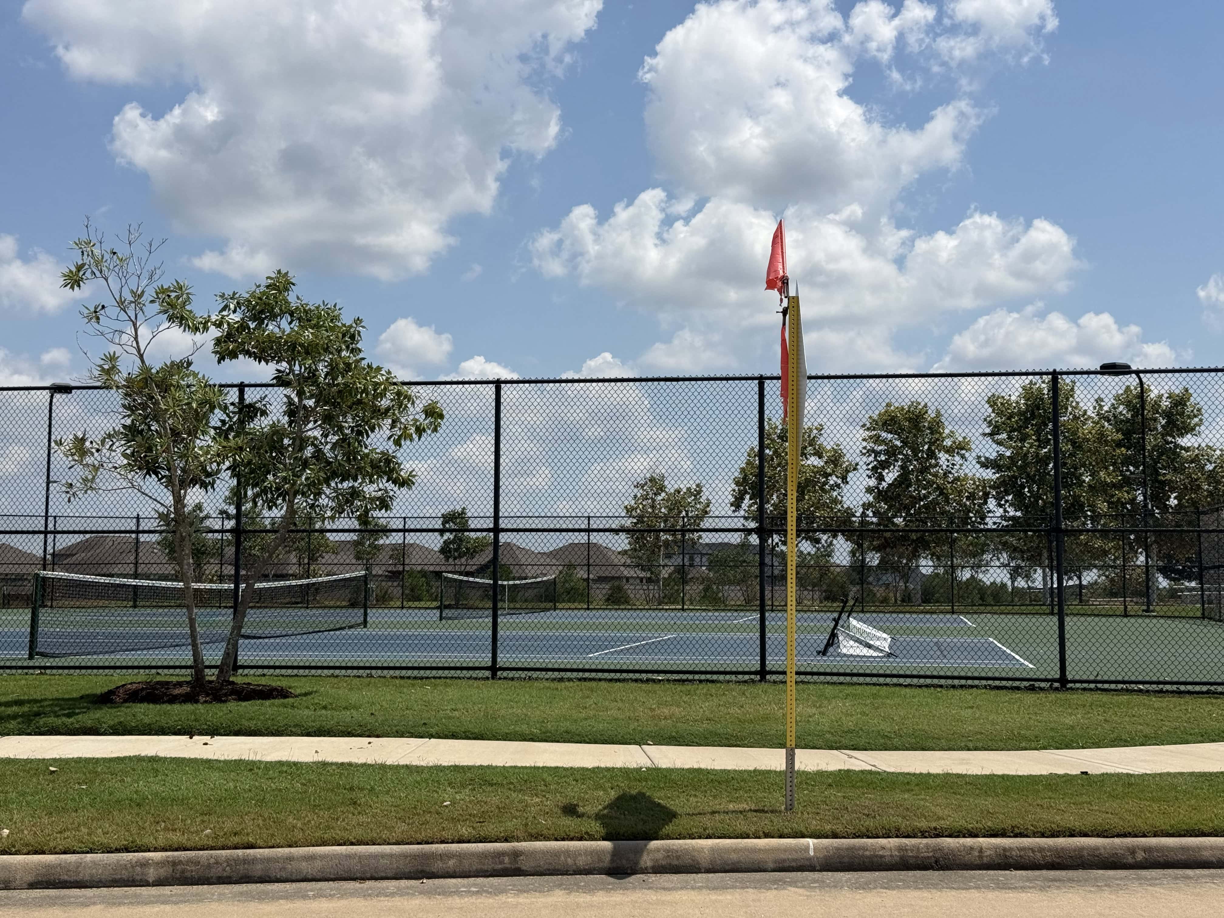 Tennis courts at Dellrose in Hockley, TX
