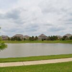 Homes for sale in Cypress $400K to $450K — a community lake and greenbelt walking trail in a Cypress, TX master-planned neighborhood