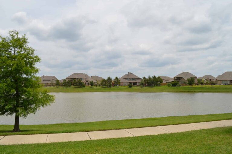 Homes for sale in Cypress $400K to $450K — a community lake and greenbelt walking trail in a Cypress, TX master-planned neighborhood