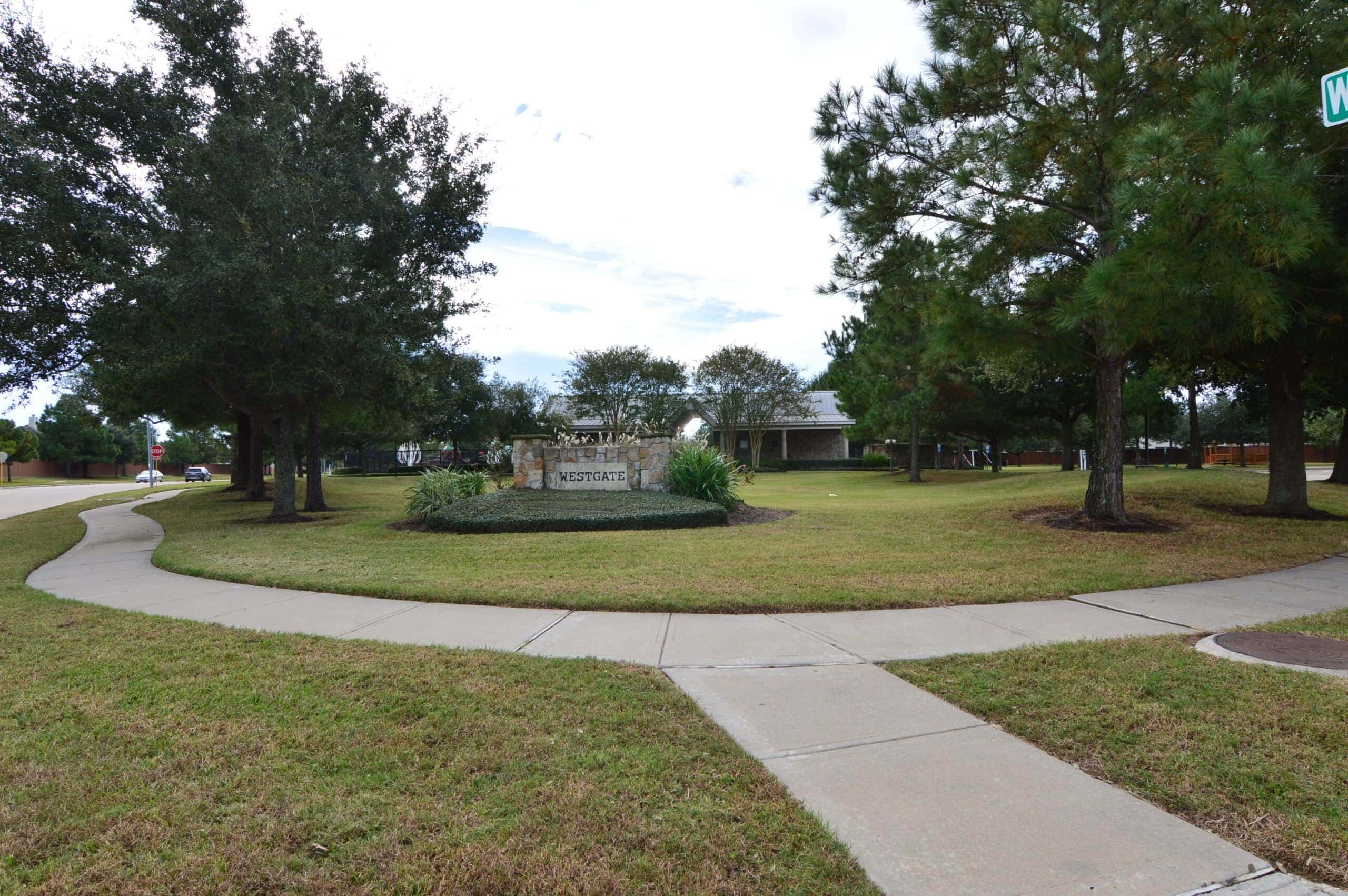Westgate entrance monument and sidewalk on Westgate Park Drive, Cypress TX 77433