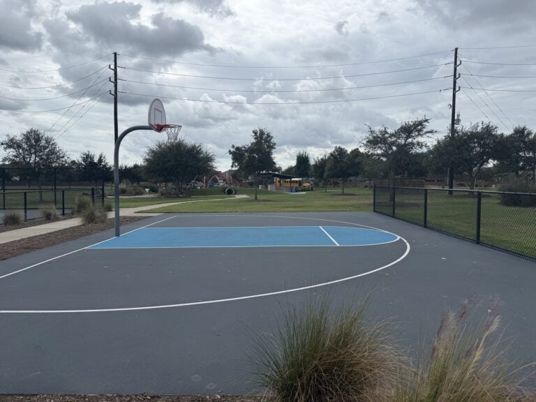 Half-court basketball court at a Cane Island park, Katy TX 77493
