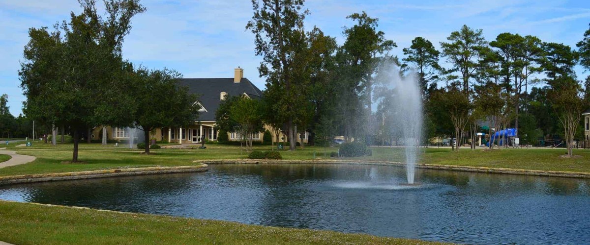 A fountain pond in front of the Coles Crossing Community Center on Barker Cypress Road in Cypress, TX 77429