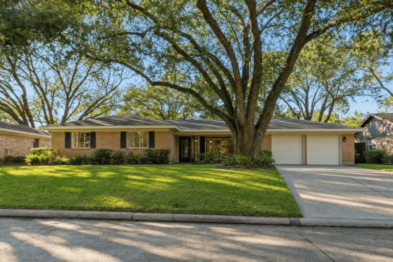 Established single-story brick ranch home on a tree-lined Houston, Texas street, typical of homes for sale in Houston $450K to $500K