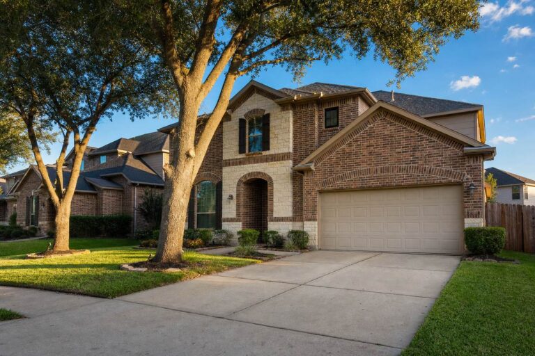 Selling your home in Katy: a two-story brick and stone home with a mature oak on a quiet Katy, TX street