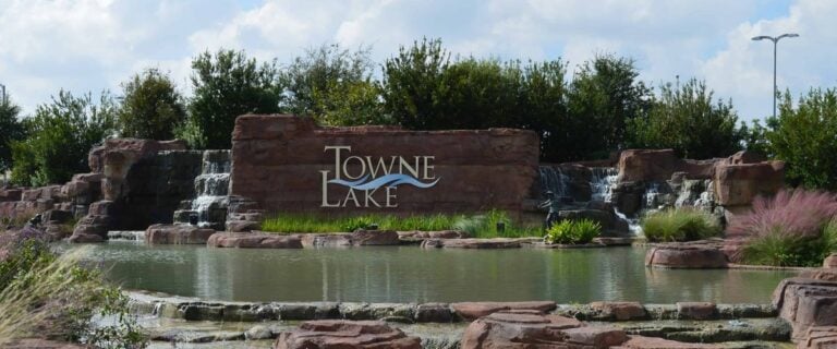 Towne Lake stone entrance monument with waterfalls and landscaping at Barker Cypress and Tuckerton in Cypress, TX 77433
